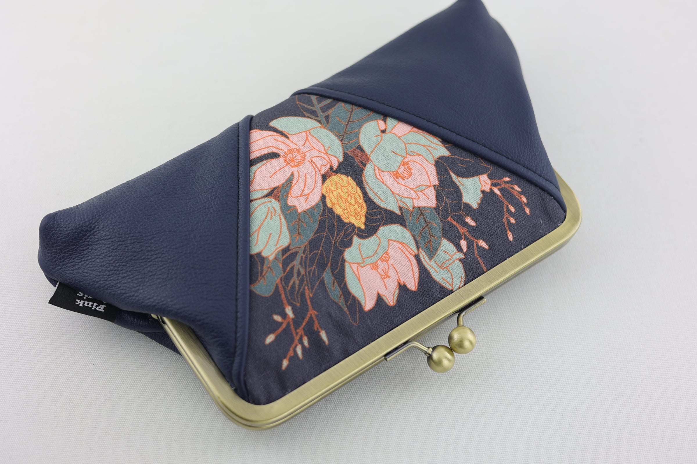 Magnolia Navy Kisslock Clutch with Chain Strap | PINK OASIS