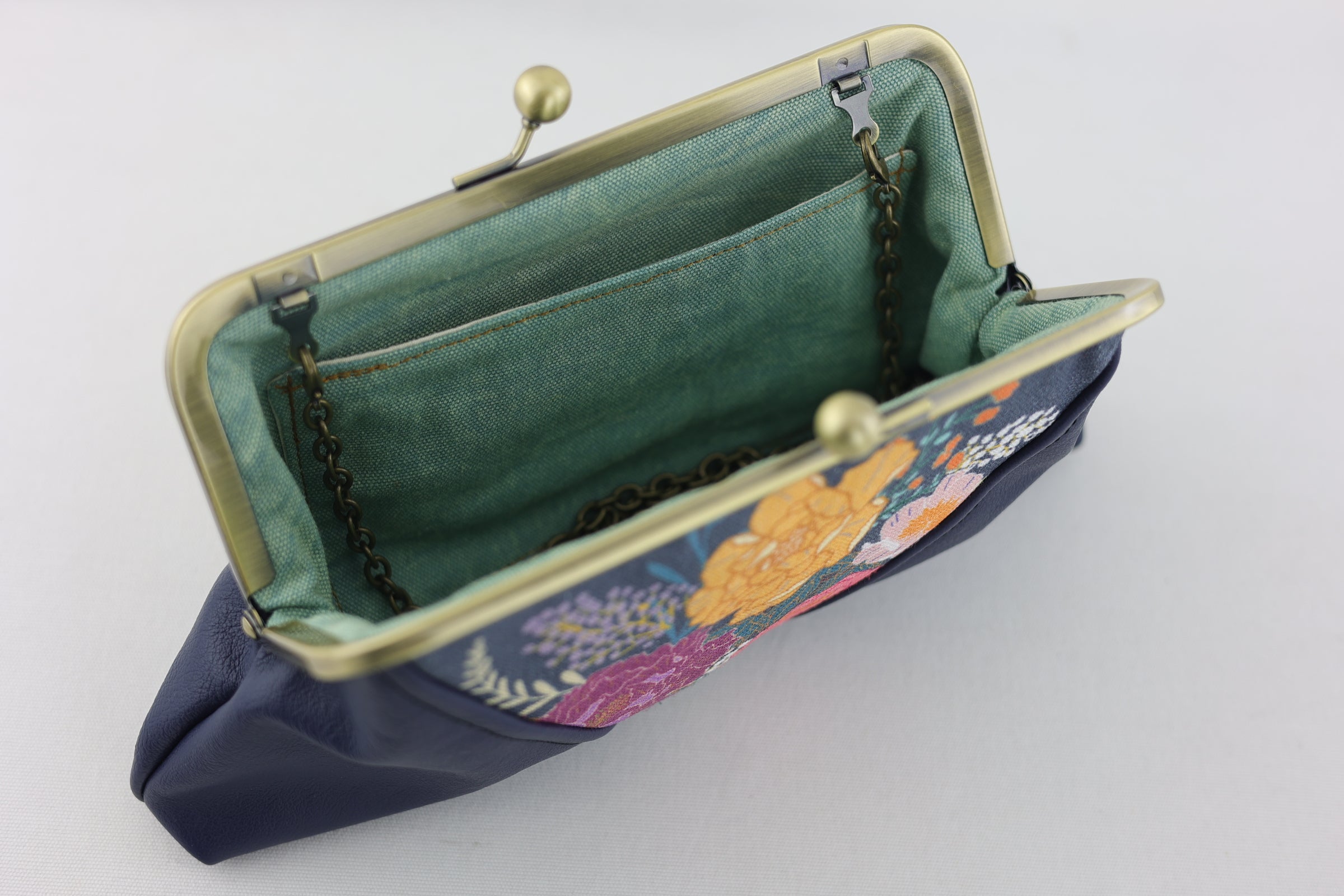 Peonies Garden Kisslock Clutch with Chain Strap | PINK OASIS