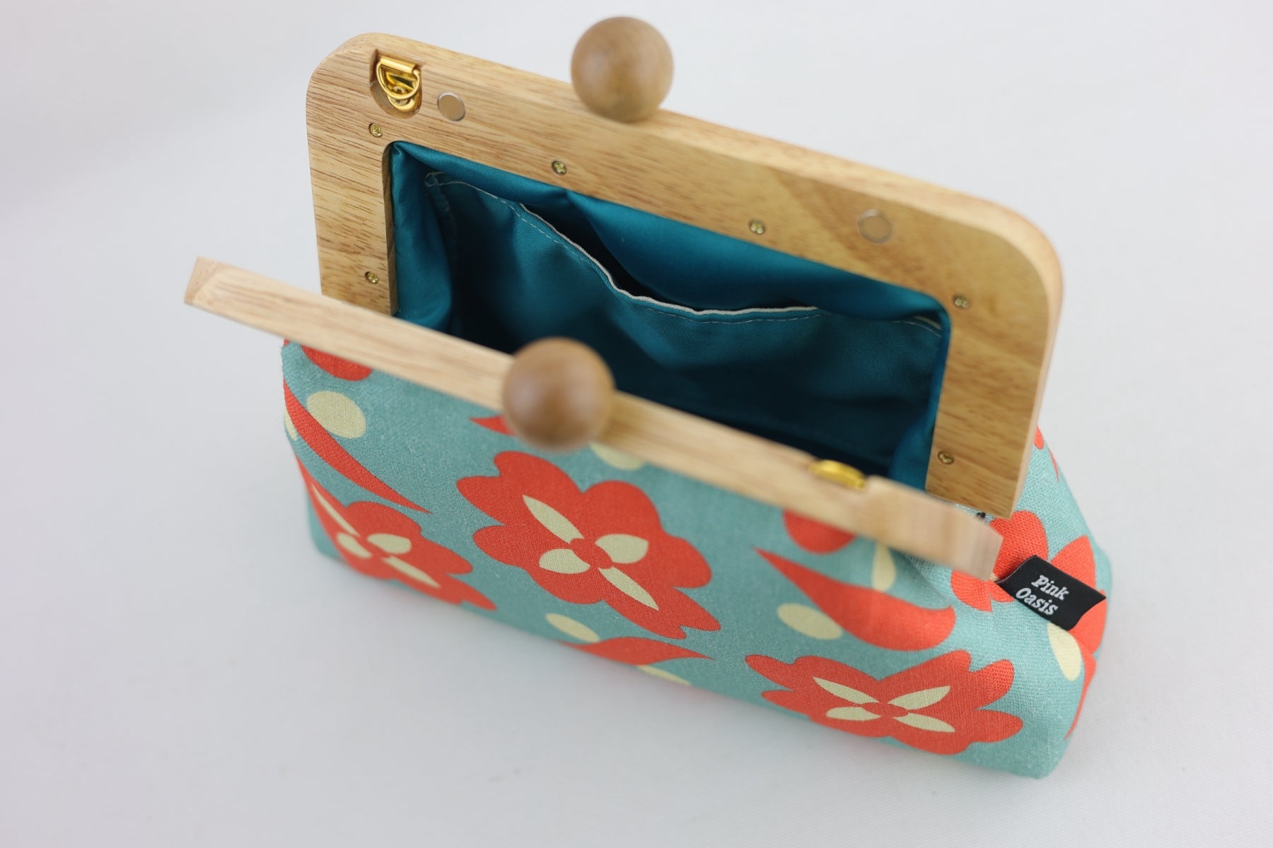 Daisy Orange & Teal Clutch | PINK OASIS