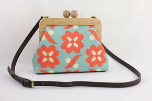 Daisy Orange & Teal Clutch | PINK OASIS