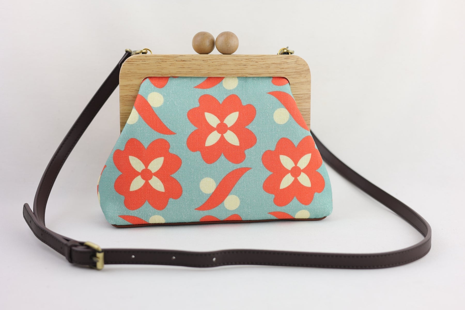 Daisy Orange & Teal Clutch | PINK OASIS
