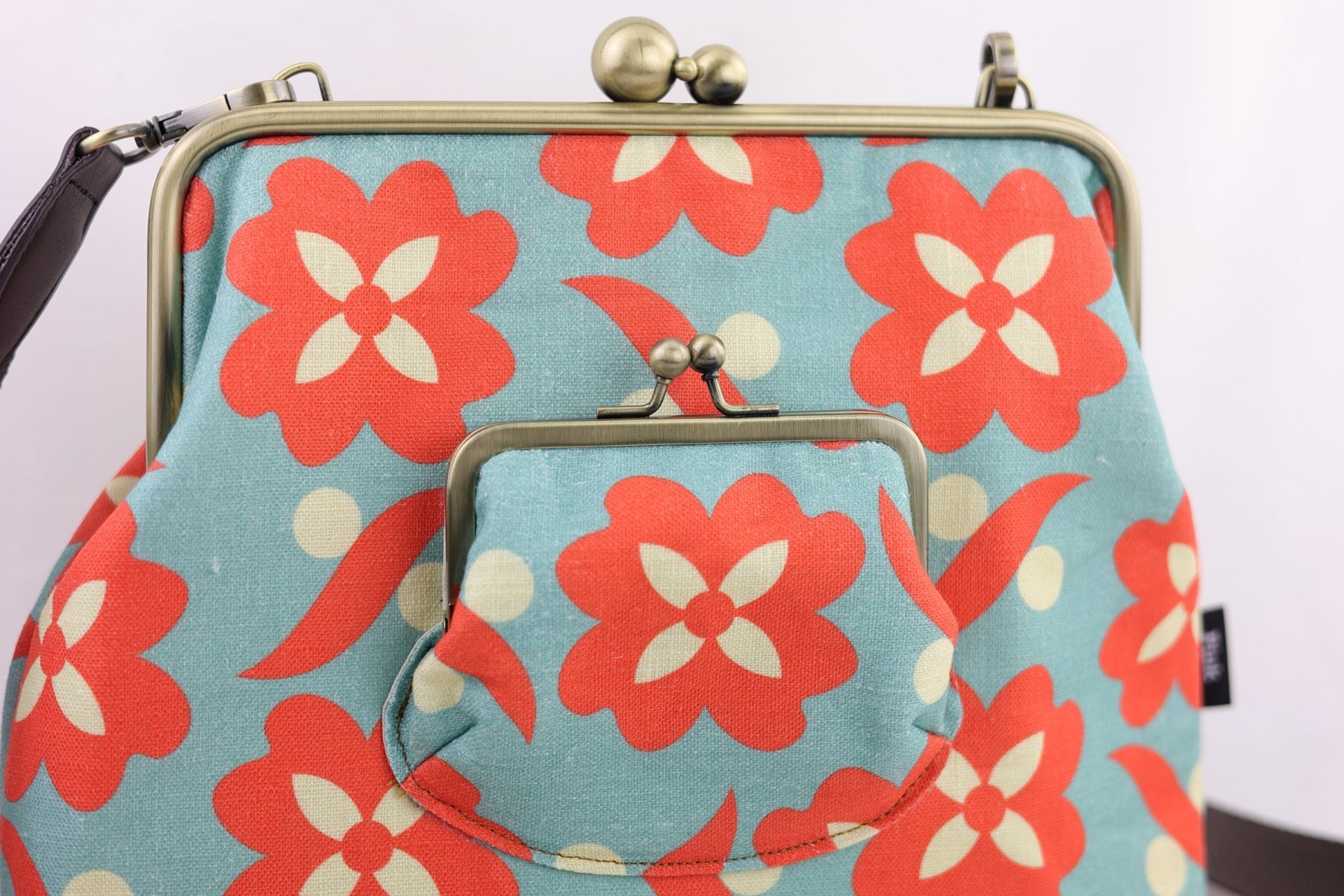 Daisy Teal & Orange Handbag and Crossbody 2 Way Bag | PINK OASIS