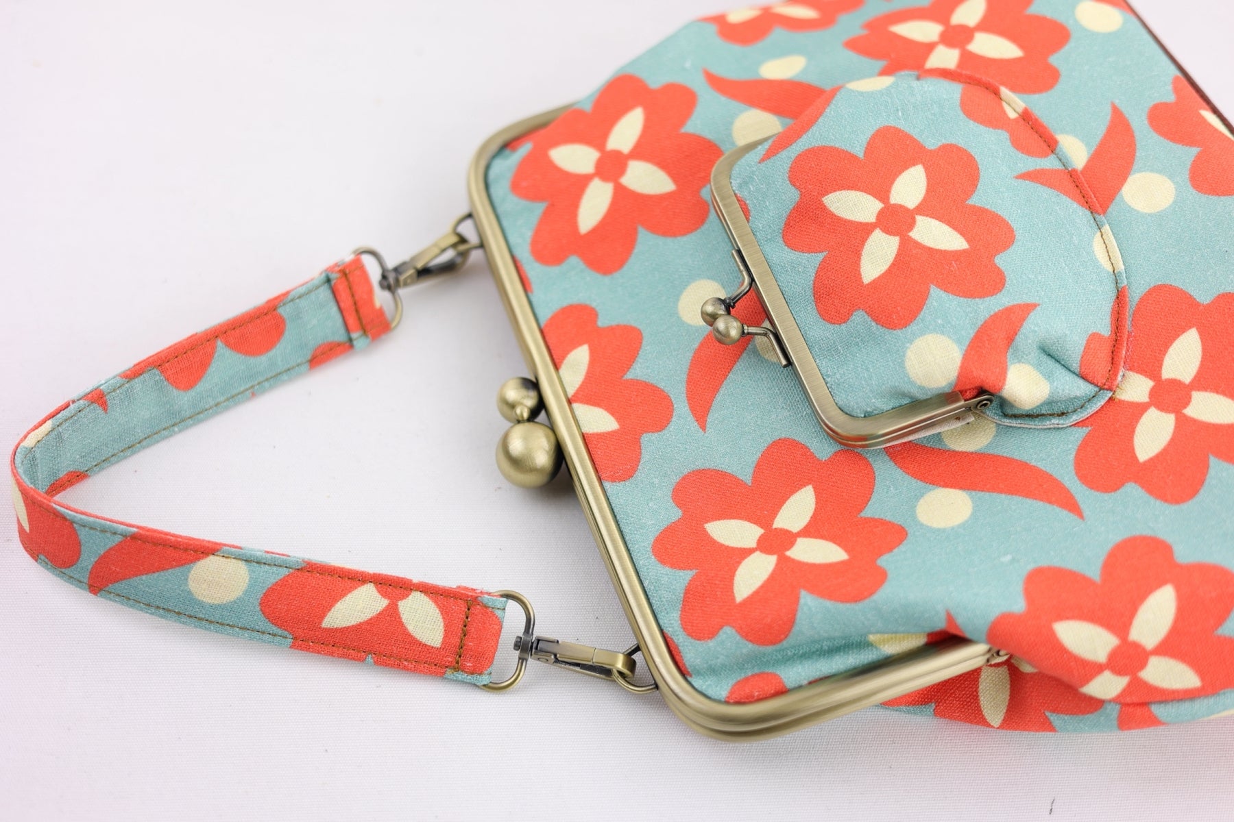 Daisy Teal & Orange Handbag and Crossbody 2 Way Bag | PINK OASIS