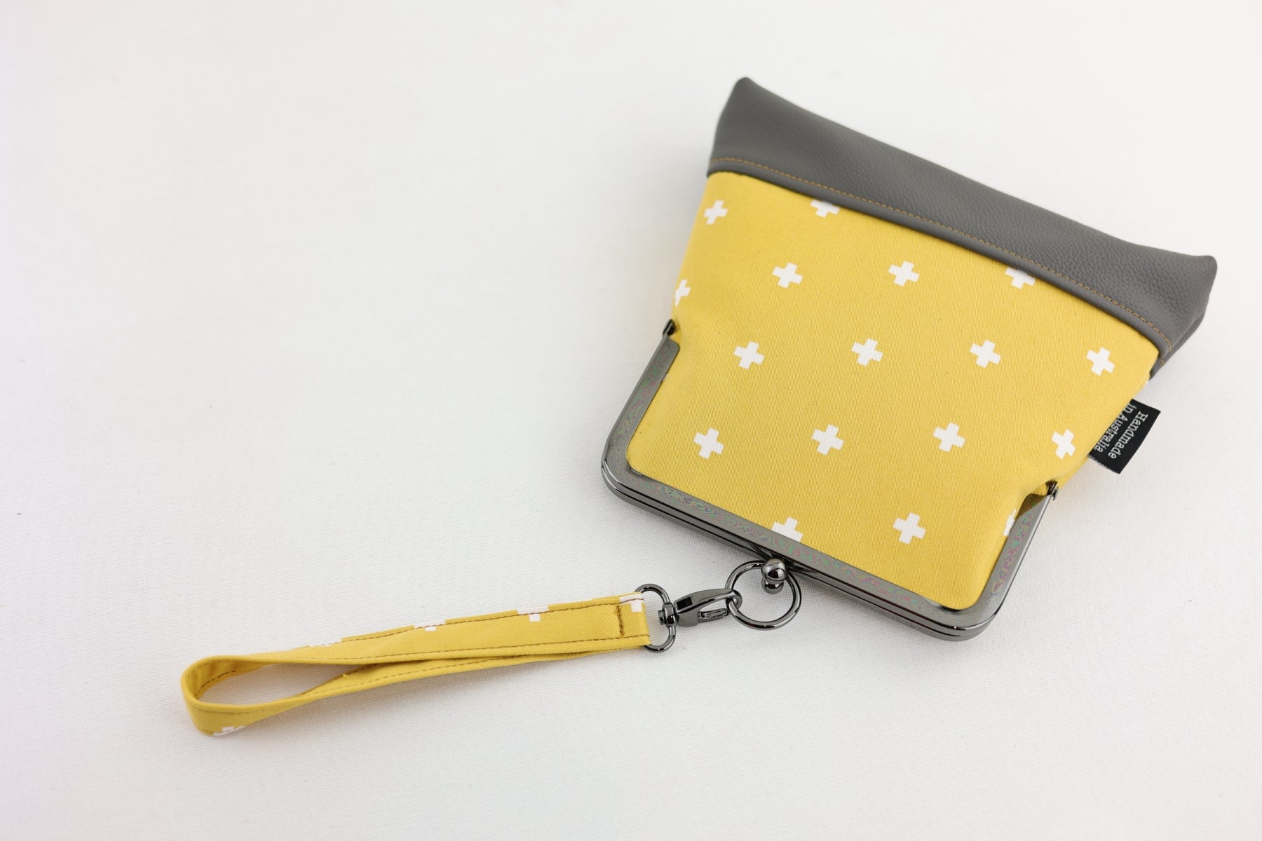 Cross Pattern Mustard & White Wristlet | PINK OASIS