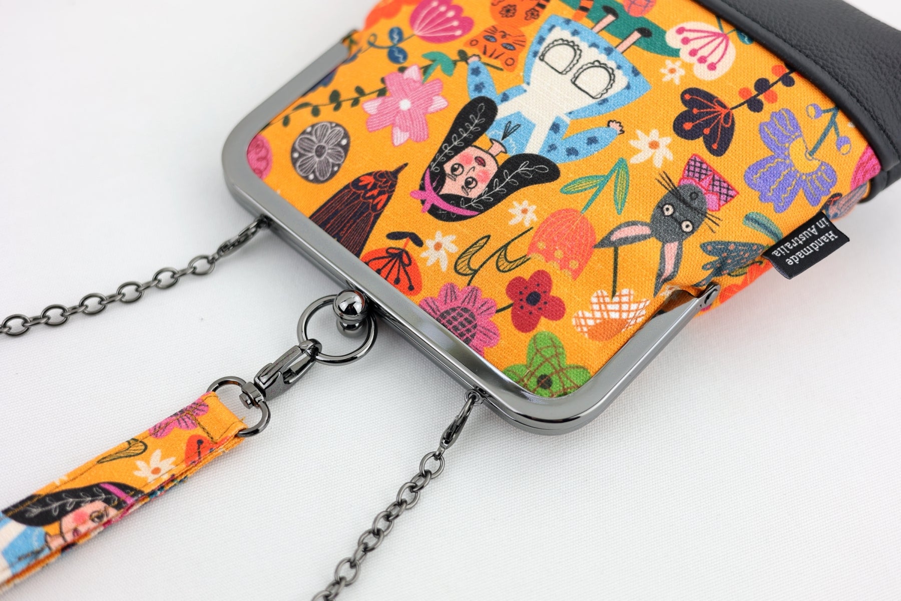 Alice in Wonderland Orange Wristlet | PINK OASIS
