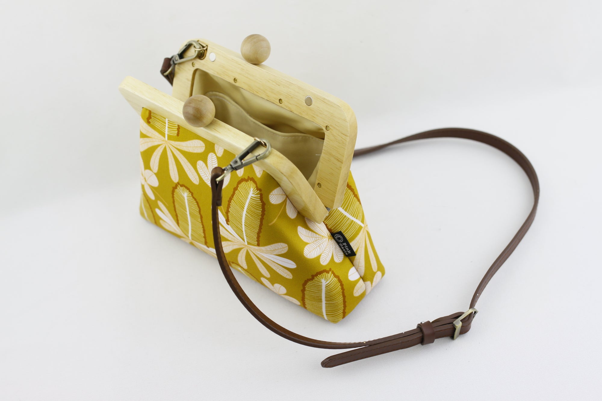 Mustard Banksia Small Wood Frame Clutch | PINKOASIS